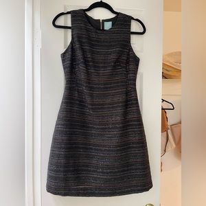 Black CeCe mini dress in size 2 with multi color shimmering horizontal stripes!